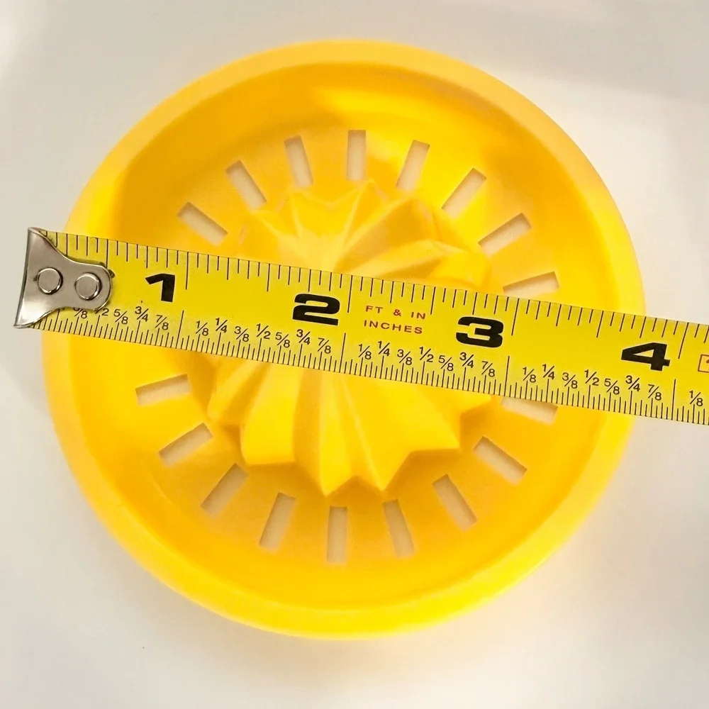 Yellow Plastic Manual Citrus Juicer Reamer with Seed Strainer 4.25 Inch Diameter